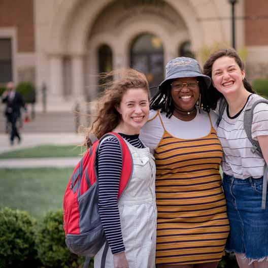 Students posing for a photo on campus